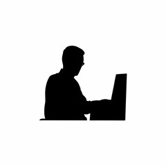 Silhouette of a programmer working on a computer with code on screen