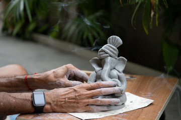 Eco friendly Ganesh Ganpati idol or murti, home made. 