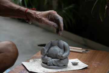 Eco friendly Ganesh Ganpati idol or murti, home made. 