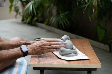  crafting an eco-friendly clay Ganesh idol for Ganesh Chaturthi 
