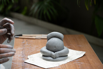  crafting an eco-friendly clay Ganesh idol for Ganesh Chaturthi 
