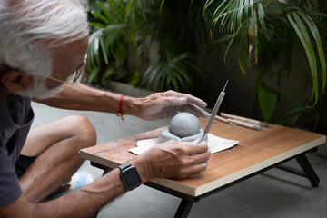  crafting an eco-friendly clay Ganesh idol for Ganesh Chaturthi 
