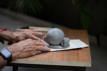  crafting an eco-friendly clay Ganesh idol for Ganesh Chaturthi 
