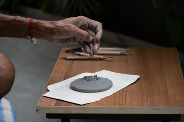  crafting an eco-friendly clay Ganesh idol for Ganesh Chaturthi 
