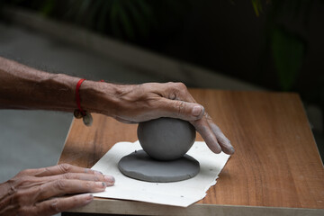  crafting an eco-friendly clay Ganesh idol for Ganesh Chaturthi 
