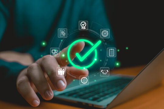 Digital approval and task completion concept with glowing green check mark icon, symbolizing business success, quality assurance, workflow efficiency, agreement, and project achievement Hand shows - Powered by Adobe