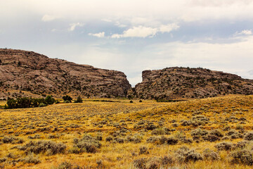 Cloudy Sky over Devil's Gate of the Sweetwater Rocks on the Sweetwater River near Sun Ranch in Southern Wyoming.