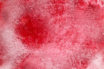 Obraz premium Background from Frozen Raspberry. Captivating Close-Up of Iced Berries, Perfect for Summer Treats.