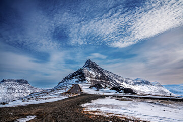 Snow-Covered Mountain with Winding Road