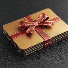 Gift cards stacked, tied with a bow