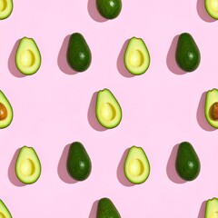 Pattern of halved avocados on a pink background