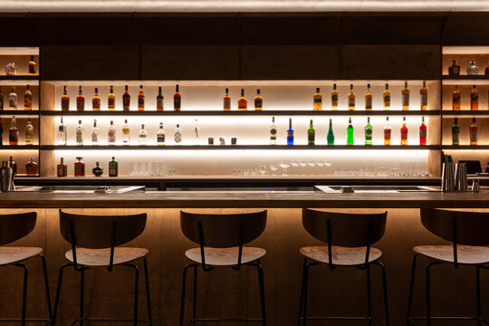 Luxury bar with drinks and bar stools