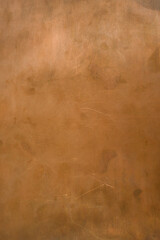 Copper backdrop. Copper surface. There are scratches and spots on the copper plate. Copy space.