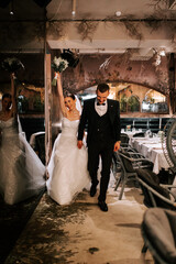 Couple celebrates marriage in a charming venue during evening reception