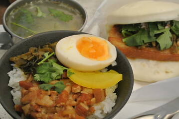 chinese pork rice and bun with soup