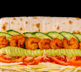 Delicious shrimp sandwich with fresh vegetables served in soft bread
