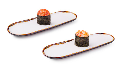 Delicious sushi rolls served on elegant plates in a minimalist setting