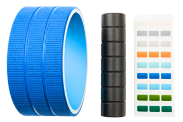 Yoga wheel with foam pads and colorful athletic therapy tape isolated with transparent background