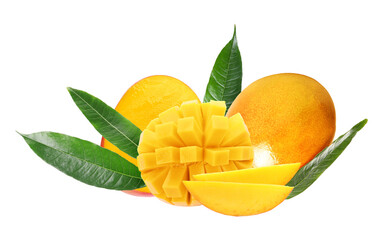 mangoes, sliced and whole, displayed with leaves on a dark background