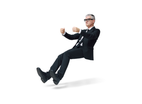 Businessman driving an invisible car and floating in mid-air