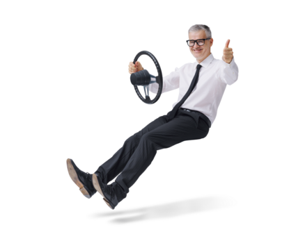 Happy corporate businessman driving an imaginary car