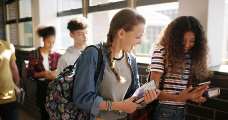 Happy people, students or phone with results in school for online curriculum, education or learning. Group, friends or teenagers with smile, books or mobile smartphone for study material or classroom