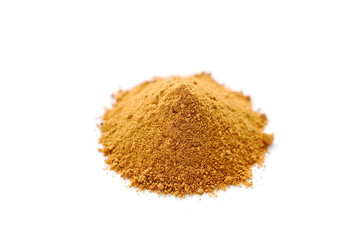 Pile of nutmeg powder isolated on white background
