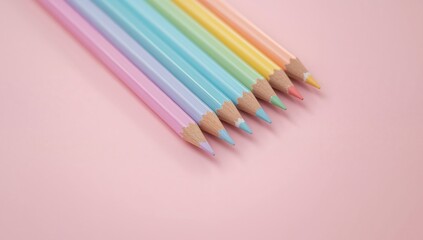 Pastel Colored Pencils on Pink Background, Minimalist School Supplies and Arts.
