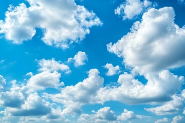 Fototapeta premium The sky is a brilliant blue with fluffy white clouds and intense sunshine combining to create absolutely perfect weather