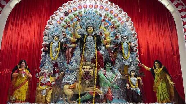 Subho mahalaya, Video of an handmade colorful idol of Goddess Durga  installed in decorated colorful Pandal during navratri festival. 