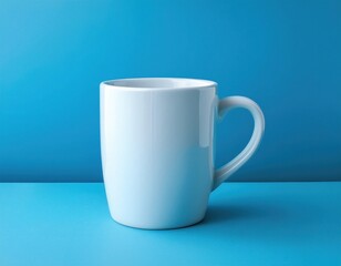Obraz premium White ceramic mug on pastel blue background
