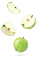 floating slices of a crisp green apple on black