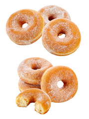 fresh donuts with powdered sugar on a dark background