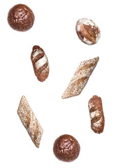 assorted small artisan breads on a black backdrop