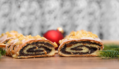 Christmas poppy seed cake, poppy seed roll cut in half, cross-section view