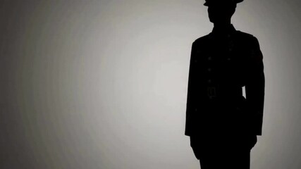 Saluting soldier silhouette animation with clean lines and gentle fades - Powered by Adobe
