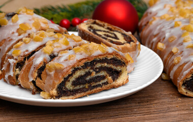 Poppy seed strudel for Christmas, a cake on the Christmas table