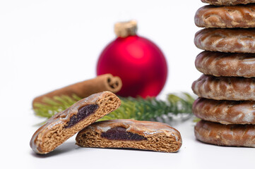 Christmas gingerbread cookies with honey and cinnamon filled with rosehip jam
