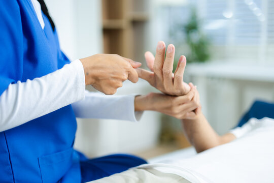healthcare worker stretching patient’s arm in clinic. Ideal for physiotherapy, injury recovery, elder care, rehab therapy, and pain relief healthcare visuals.