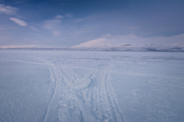 Stunning landscapes of Swedish Lapland, where snowy mountains, frozen lakes and endless forests create a magical Arctic wilderness.