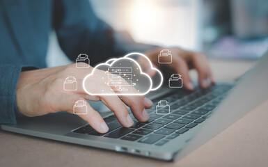 Naklejka premium Close up of businessman hands typing on laptop, managing documents and uploading data to an online server. Cloud computing technology concept for database storage and document management system (DMS).