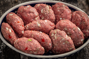 Homemade beef burgers ready to be cooked