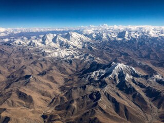 Aerial view of snowcapped mountain range