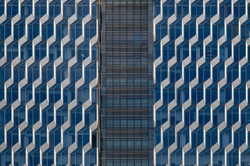 Modern abstract facade of a glass building in Chongqing, China