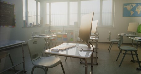 Modern Computer Classroom with White Desks, Chairs and Computer Monitors for Students. Bright Learning Environment for Digital Education, Programming Lessons, Creative 3D Design Projects. Dolly Shot.