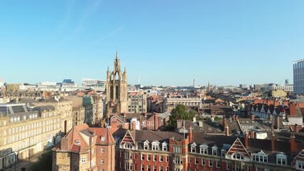 Newcastle upon Tyne: 17th Aug 2025: Aerial view showcasing Newcastle city skyline and St Nicholas Cathedral. Drone footage reveal on sunny morning