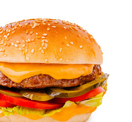 Juicy cheeseburger with fresh toppings on a sesame seed bun