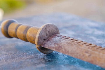 Antique rare bayonet knife covered with rust and dirt