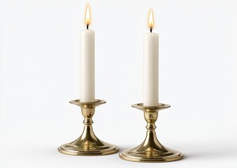 Two gold-toned candle holders with white candles burning
