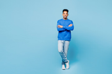 Full body young man of African American ethnicity wear sweatshirt casual clothes stand hold hands...
